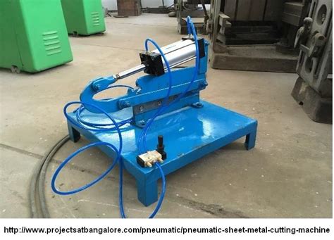 fabrication of pneumatic sheet metal cutting machine|pneumatic paper cutting machine.